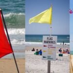 Beach Flag Rules: What do red, yellow, purple, green, and double flags mean at the beach? Why every traveller should be aware of these beach rules |