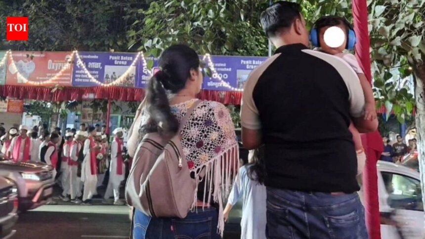 ‘That’s what sensible parenting looks like’: Pune parents win praise for putting headphones on baby at loud dhol-tasha procession, sparking debate on infant hearing safety